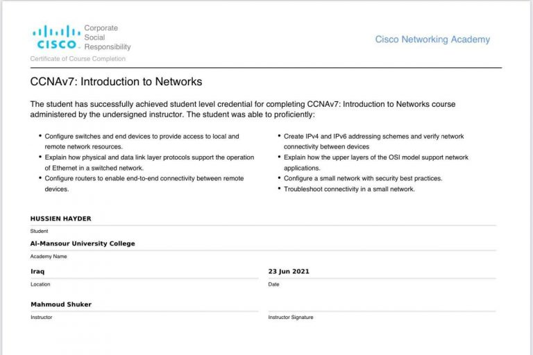 A programmer at the College of Nursing / University of Kerbala receives a training certificate from the Cisco Networking Academy